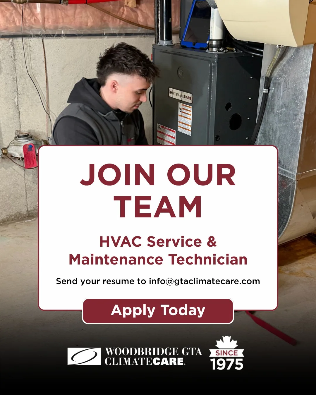 Technician working on an HVAC unit in a basement.