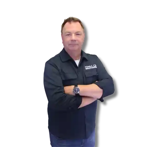 HVAC technician from The Chill Brothers posing confidently.