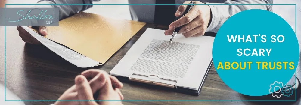 Discussion on trusts with documents and hands visible.