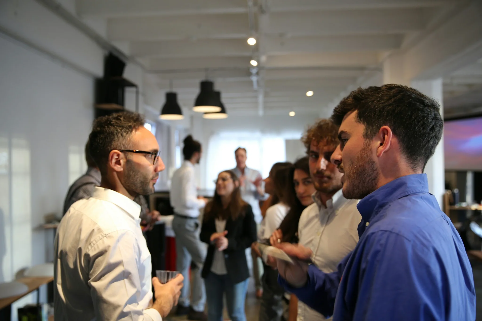 Networking event with professionals in conversation