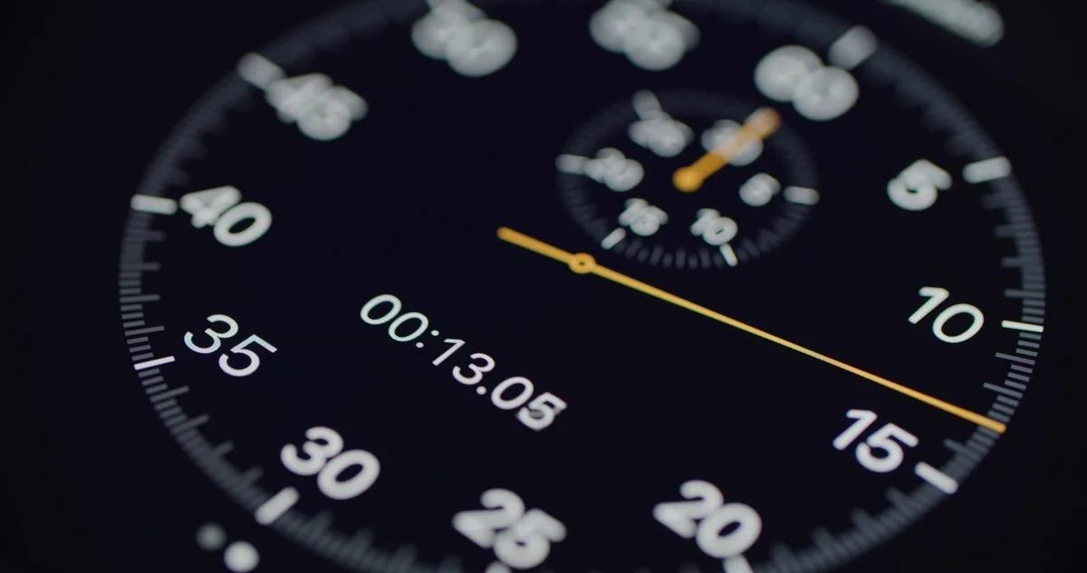 A close-up of a stopwatch showing 13 seconds.