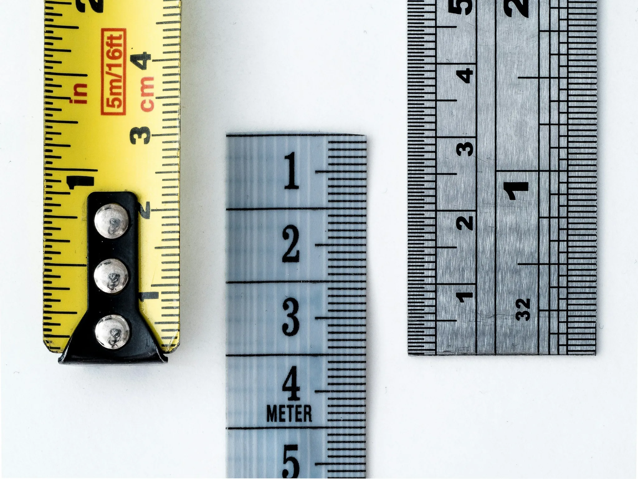 Three measuring tools on a white background