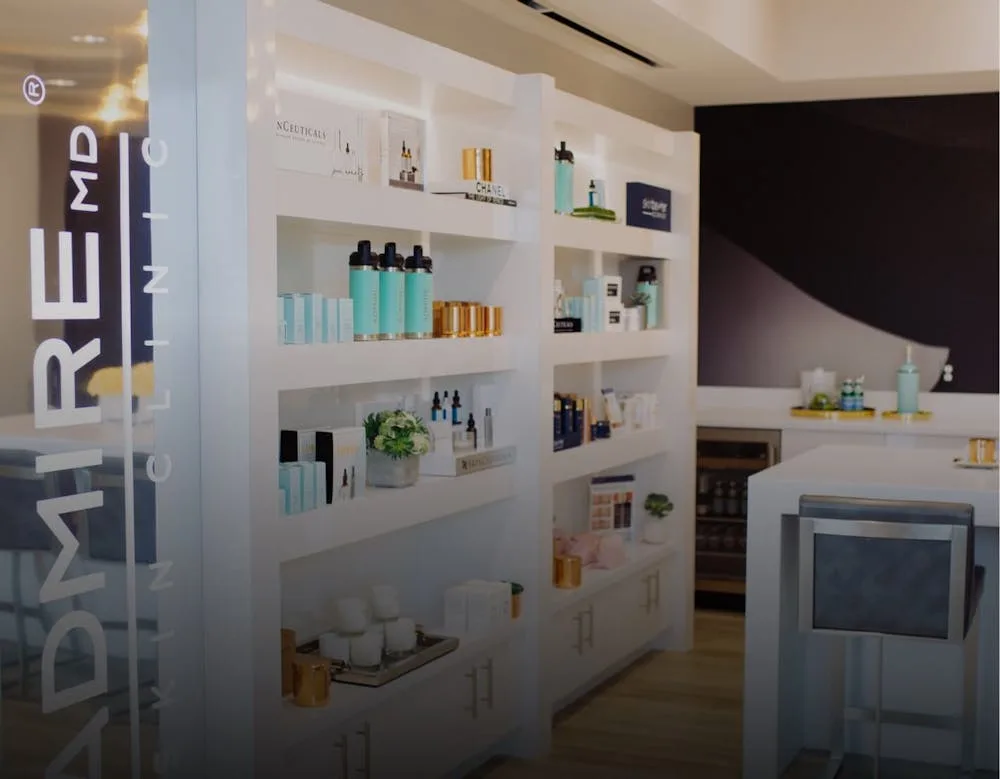Interior view of AdmireMD clinic showcasing skincare products.