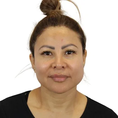 A woman with a smooth complexion facing the camera.