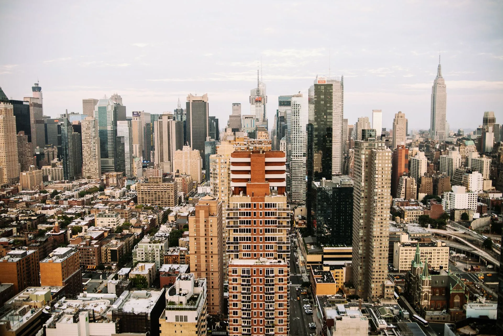 Panoramic view of a city skyline with skyscrapers.