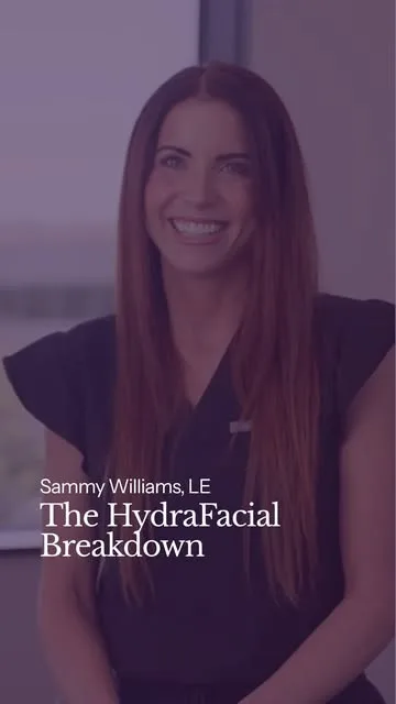 A woman discussing HydraFacial treatment in a medspa.