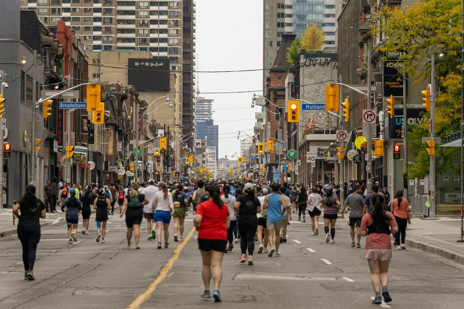 Runners participating in a marathon on a city street.