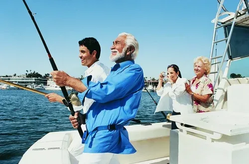 People enjoying a fishing trip on a boat.