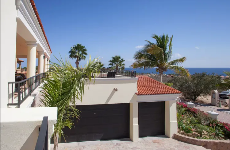 Coastal view from a luxury villa overlooking the ocean.
