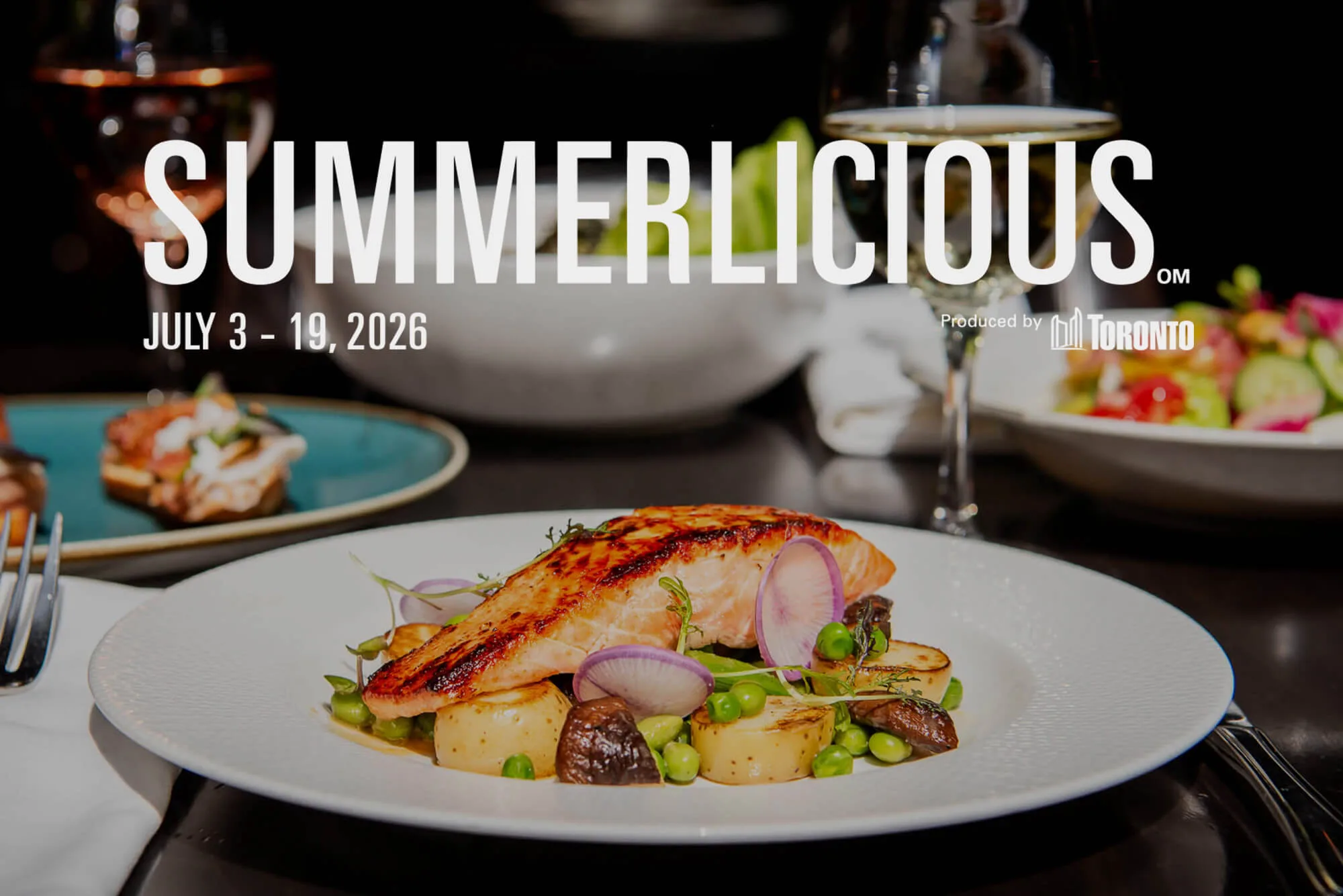 A plate of seared salmon with potatoes and vegetables for Summerlicious.