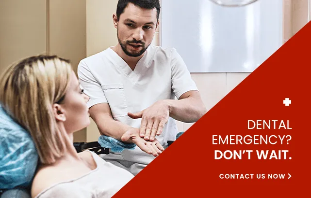 A dentist explaining care to a patient in a dental clinic.