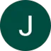 Avatar of a smiling individual for a review.