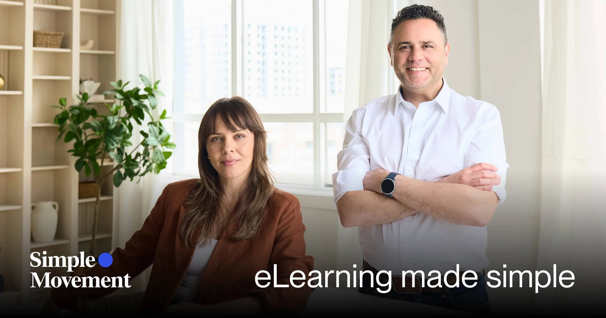 Two professionals in an office promoting eLearning services.