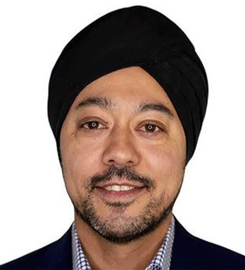 Portrait of Dr. Amarjit Rihal, dentist at Assiniboine Dental Group.