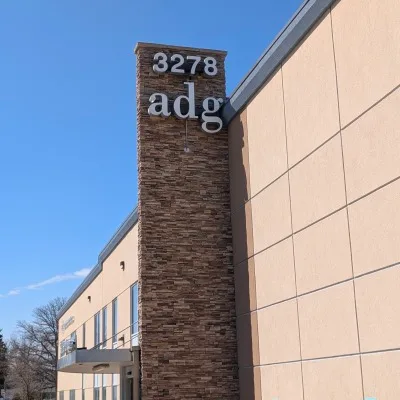 Exterior view of Assiniboine Dental Group building.