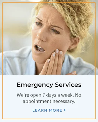 A woman in pain holding her jaw with emergency services text.